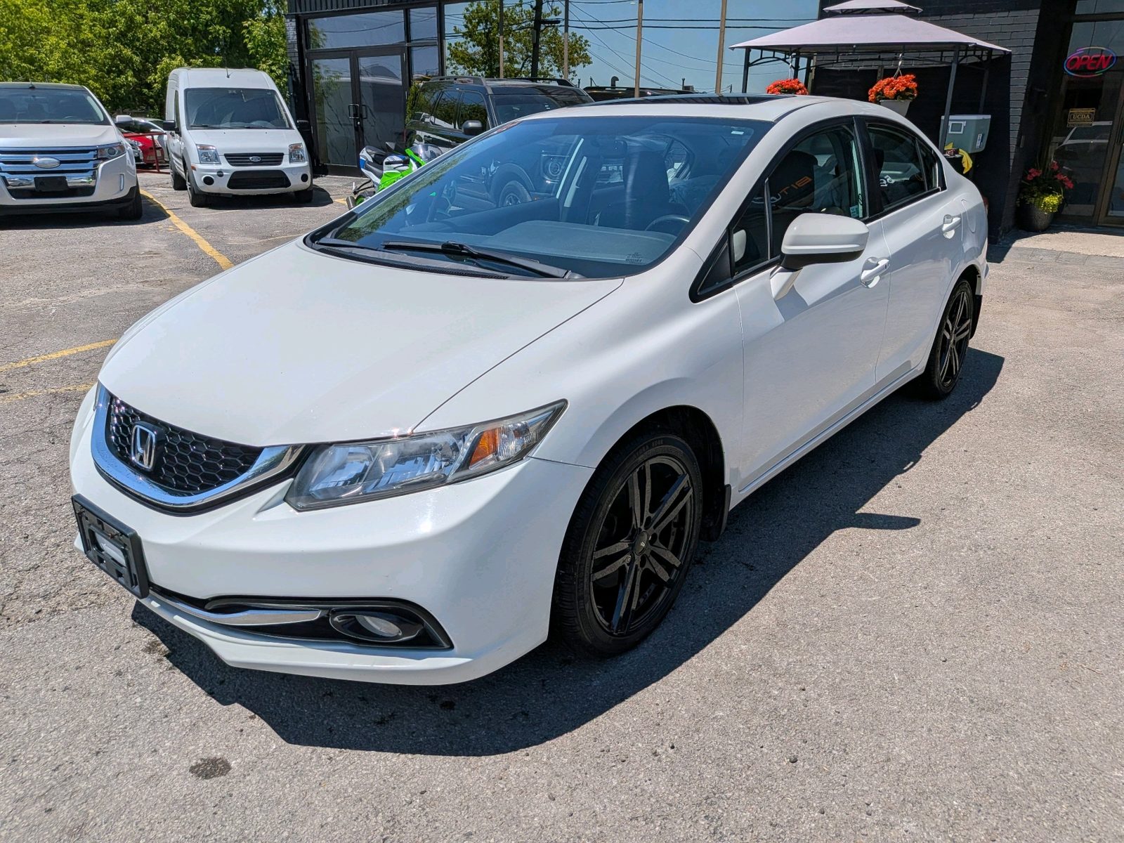 2015 Honda Civic 4dr Auto Touring, photo 1 of 14