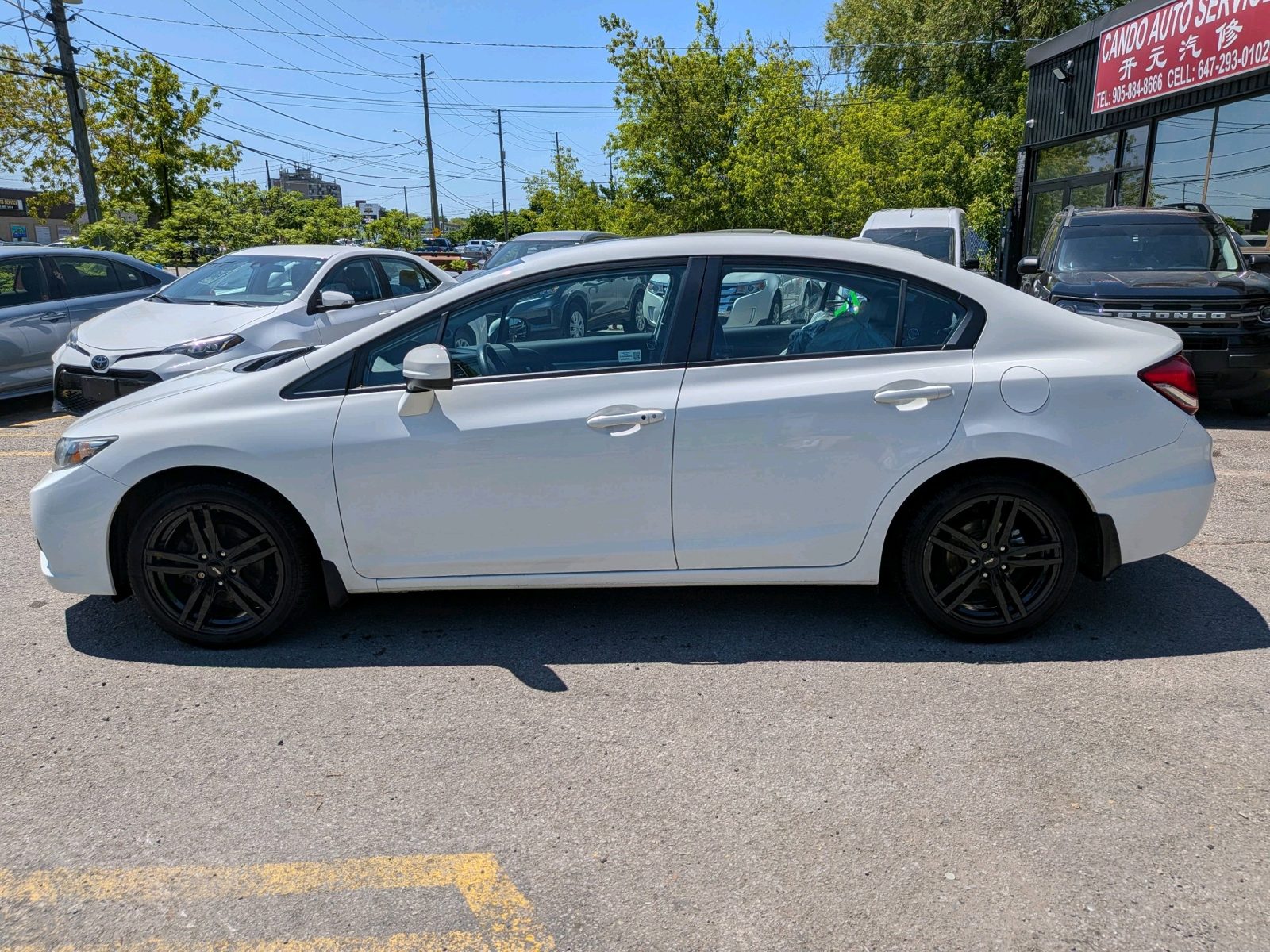 2015 Honda Civic 4dr Auto Touring, photo 2 of 14