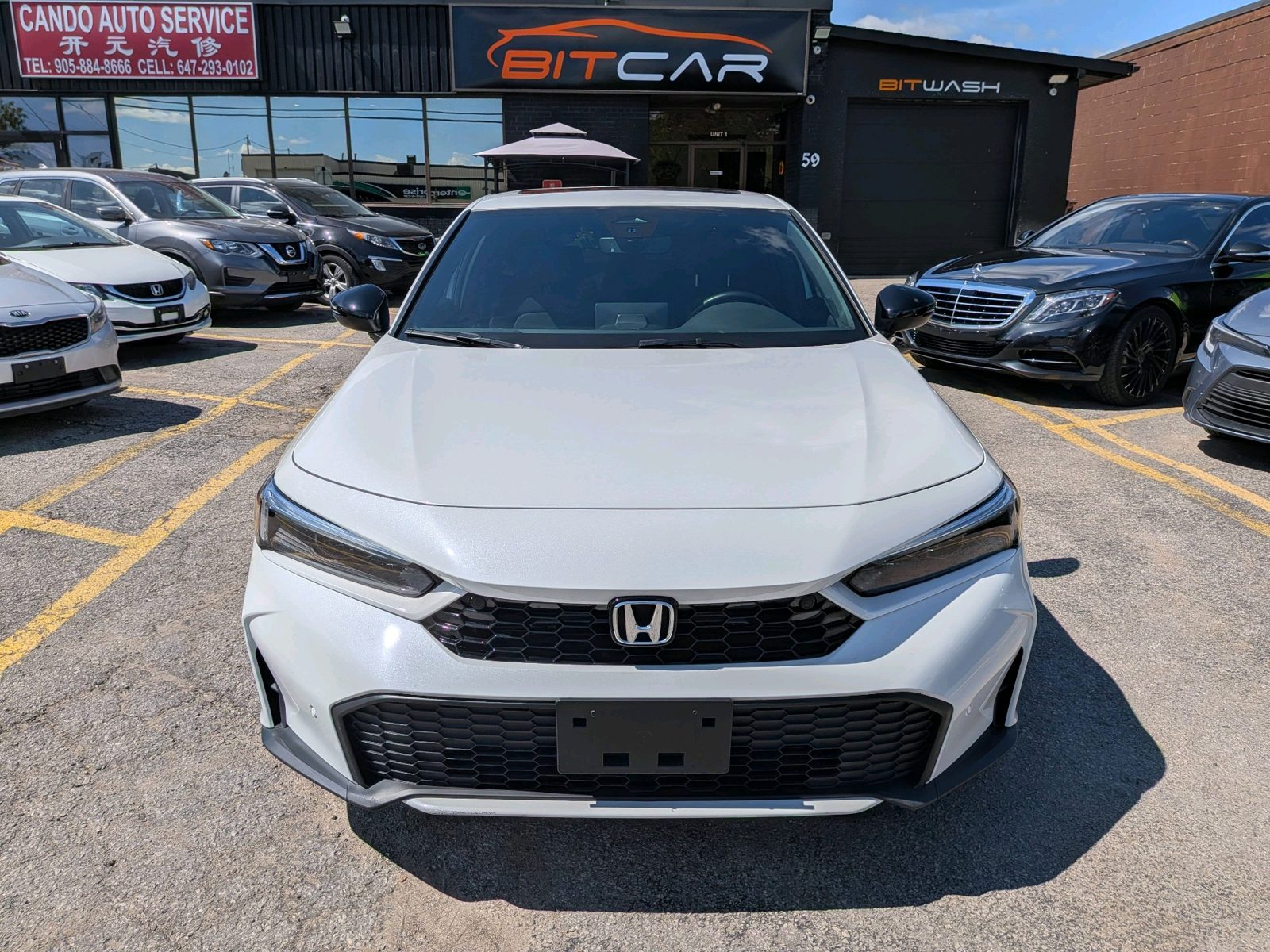 2025 Honda Civic Sport eCVT, photo 8 of 16