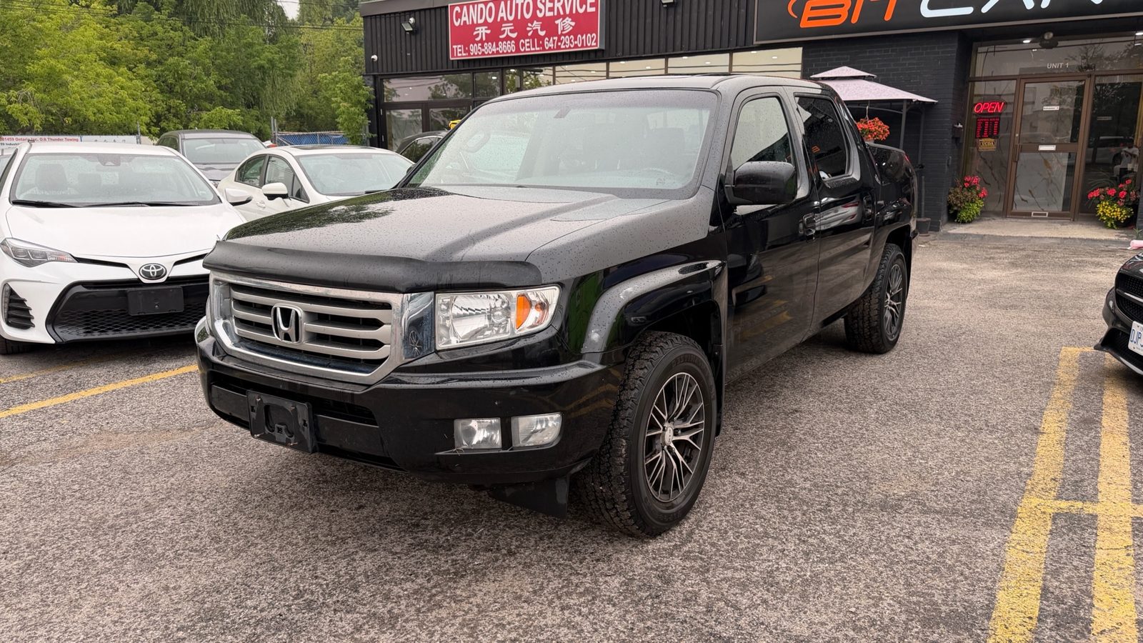 2012 Honda Ridgeline 4WD Crew Cab Touring, photo 1 of 18