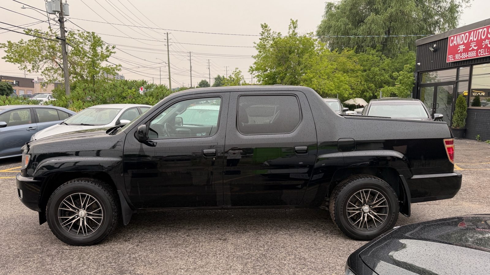 2012 Honda Ridgeline 4WD Crew Cab Touring, photo 2 of 18
