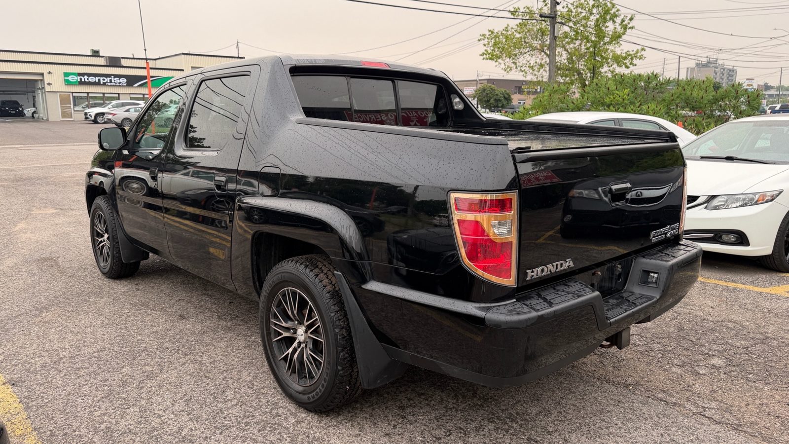2012 Honda Ridgeline 4WD Crew Cab Touring, photo 3 of 18