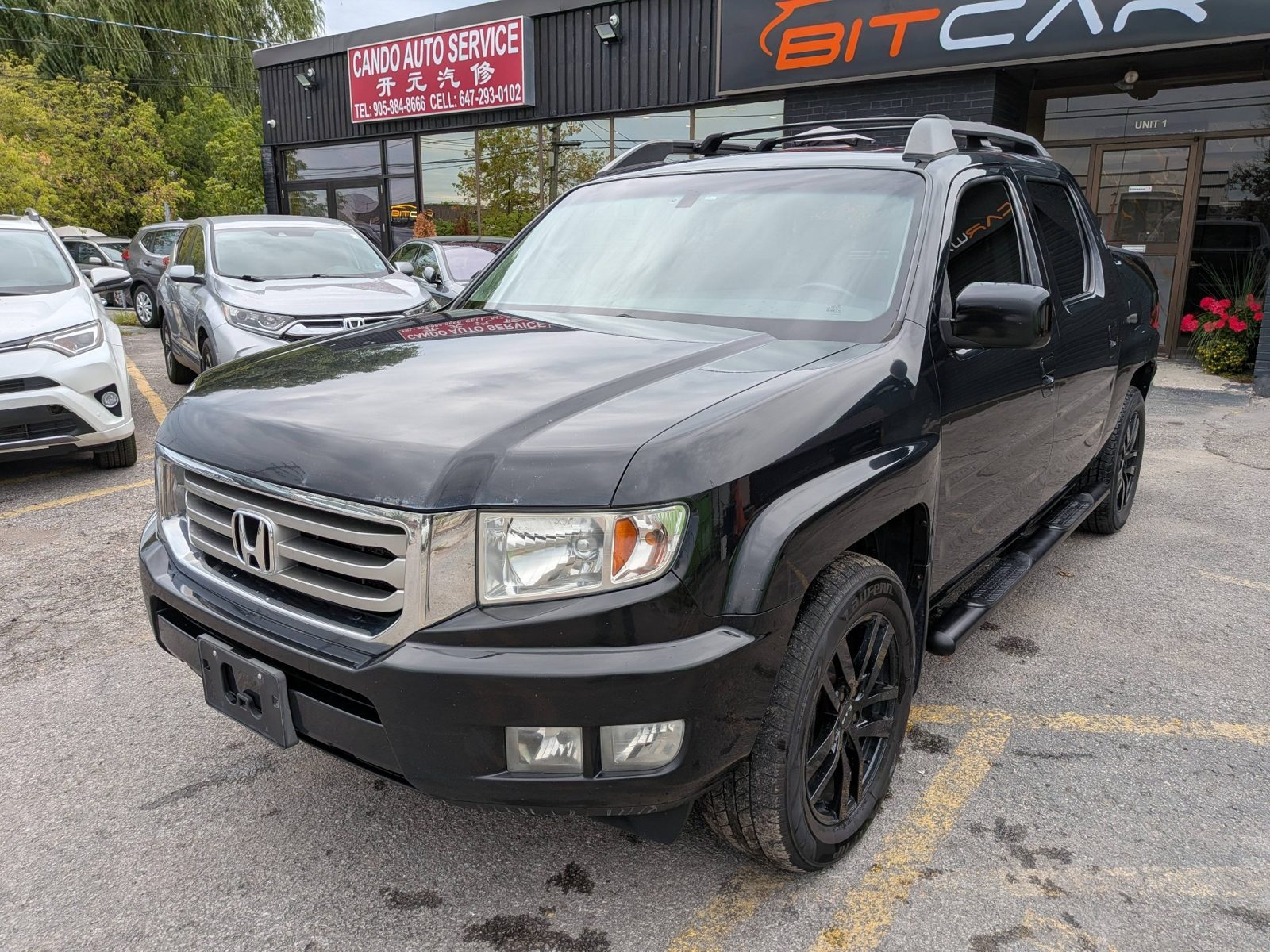 2012 Honda Ridgeline 4WD Crew Cab Touring, photo 1 of 24