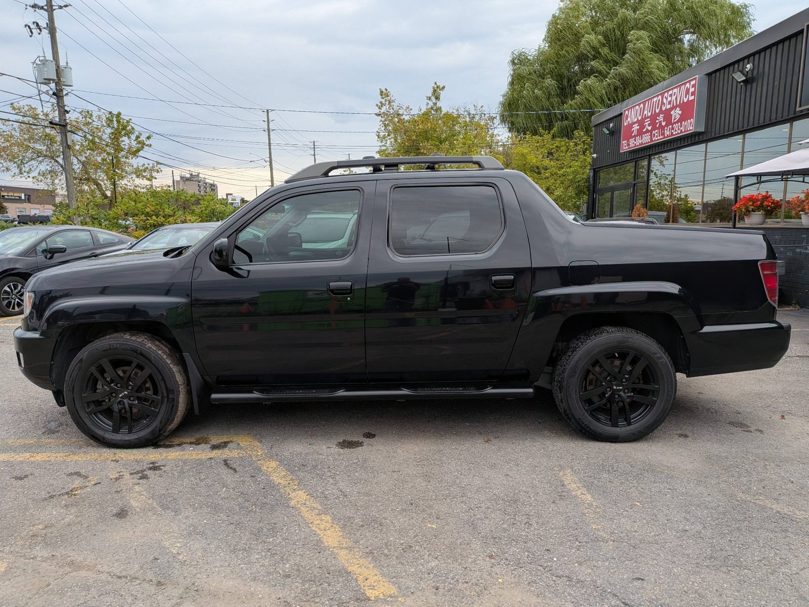 2012 Honda Ridgeline 4WD Crew Cab Touring, photo 2 of 24