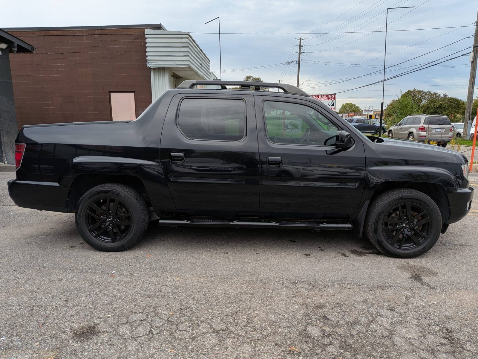 2012 Honda Ridgeline 4WD Crew Cab Touring, photo 6 of 24